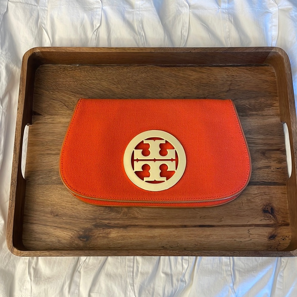 Tory Burch canvas clutch with gold metal medallion on front!